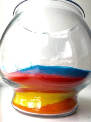 colored sand in bowl for terrarium